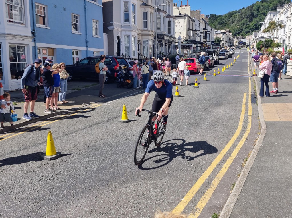 Cyclists riding the Llandudno triathlon course as they head out onto the next lap of the Great Orme.