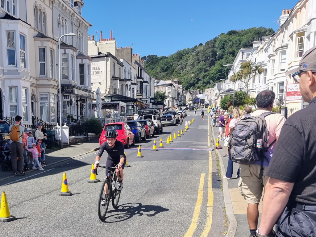 Cyclists riding the Llandudno triathlon course as they head out onto the next lap of the Great Orme.