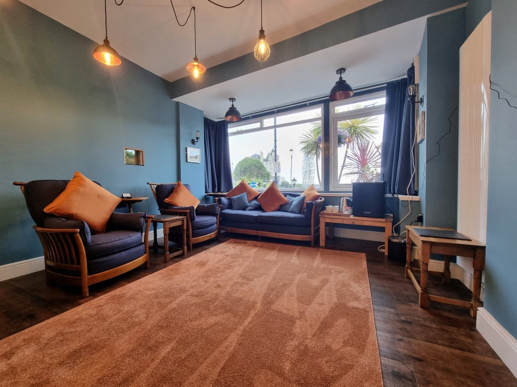Lounge overlooking gardens with views towards the Wheel and Little Orme